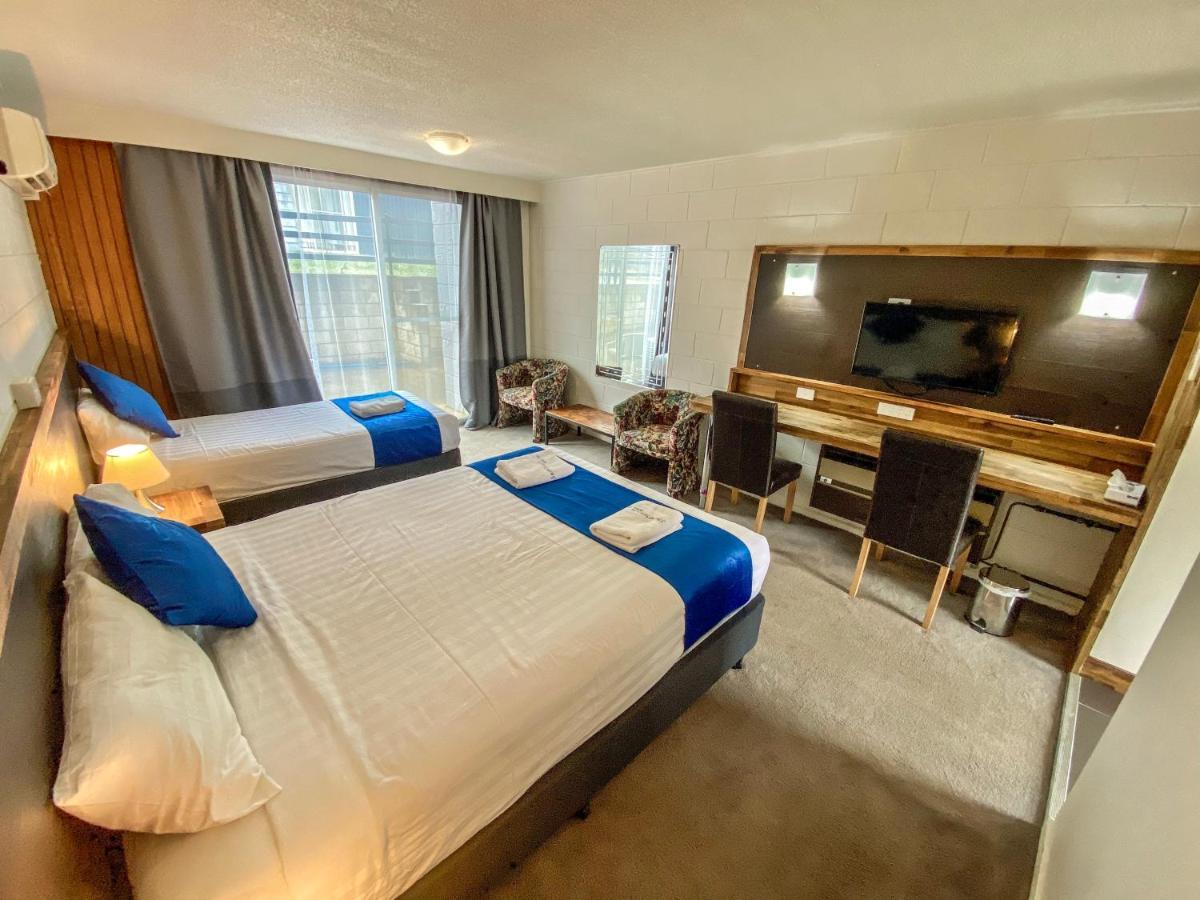 Snow Season Motor Inn Кума Экстерьер фото