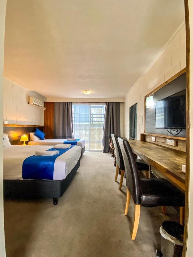 Snow Season Motor Inn Кума Экстерьер фото