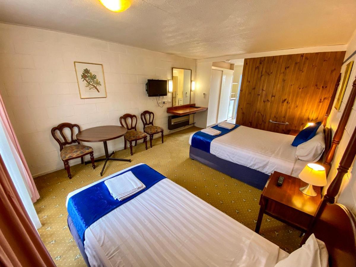 Snow Season Motor Inn Кума Экстерьер фото