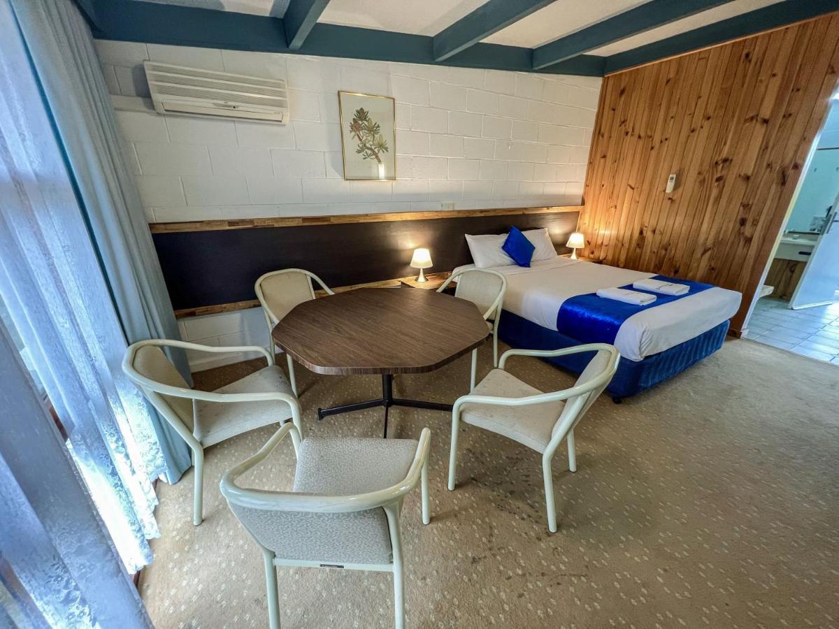 Snow Season Motor Inn Кума Экстерьер фото