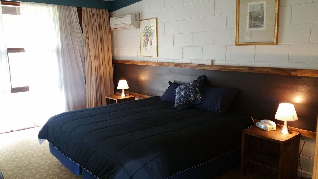 Snow Season Motor Inn Кума Экстерьер фото